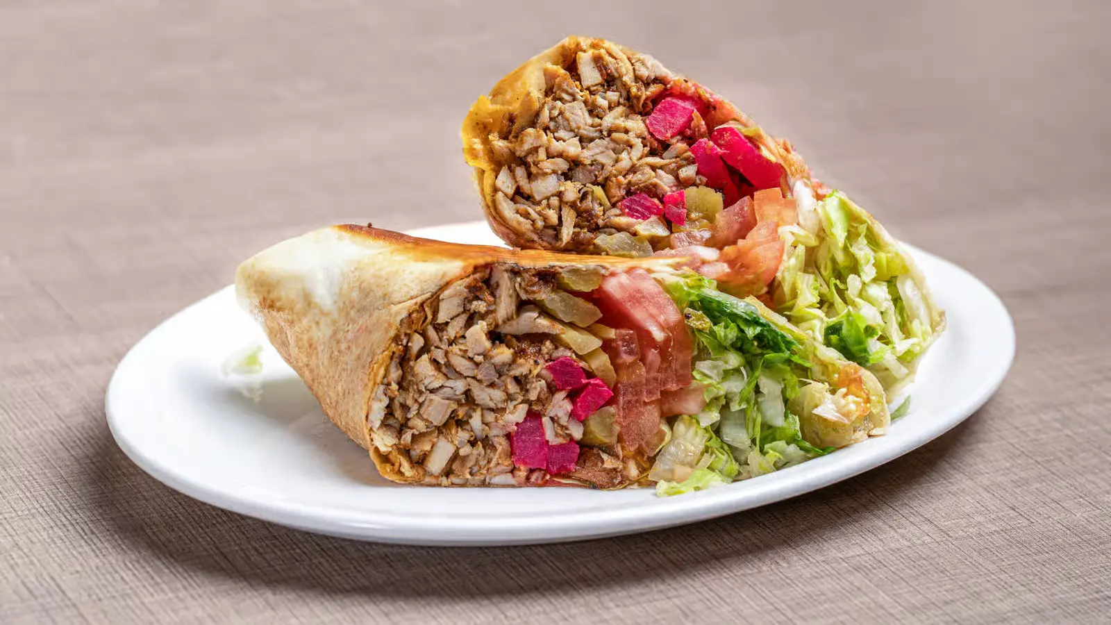 Garlic Potatoes served with donair at Donair & Shawarma House West