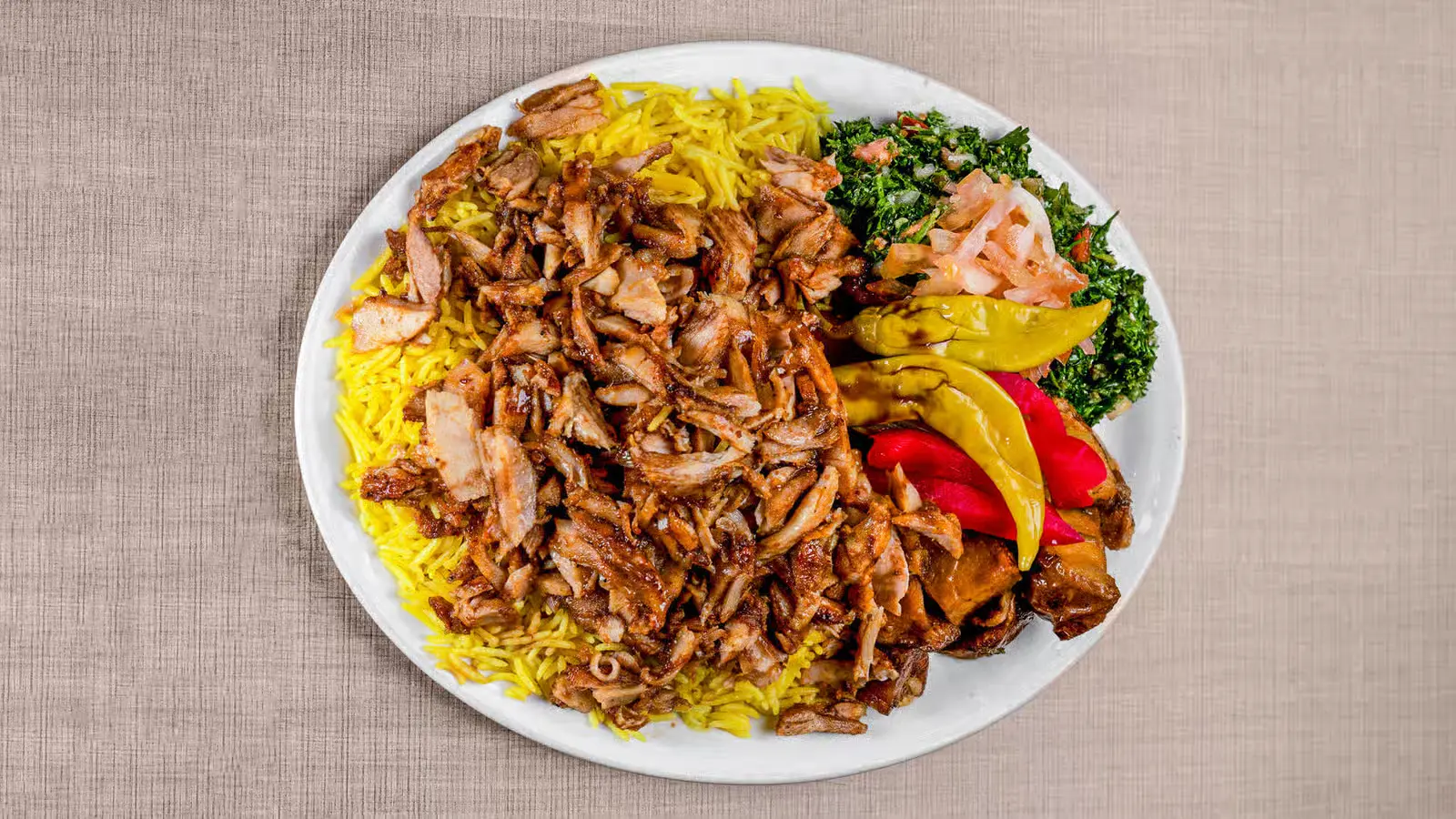 Chicken Shawarma Platter with seasoned rice and tabbouleh at Donair & Shawarma House West Edmonton
